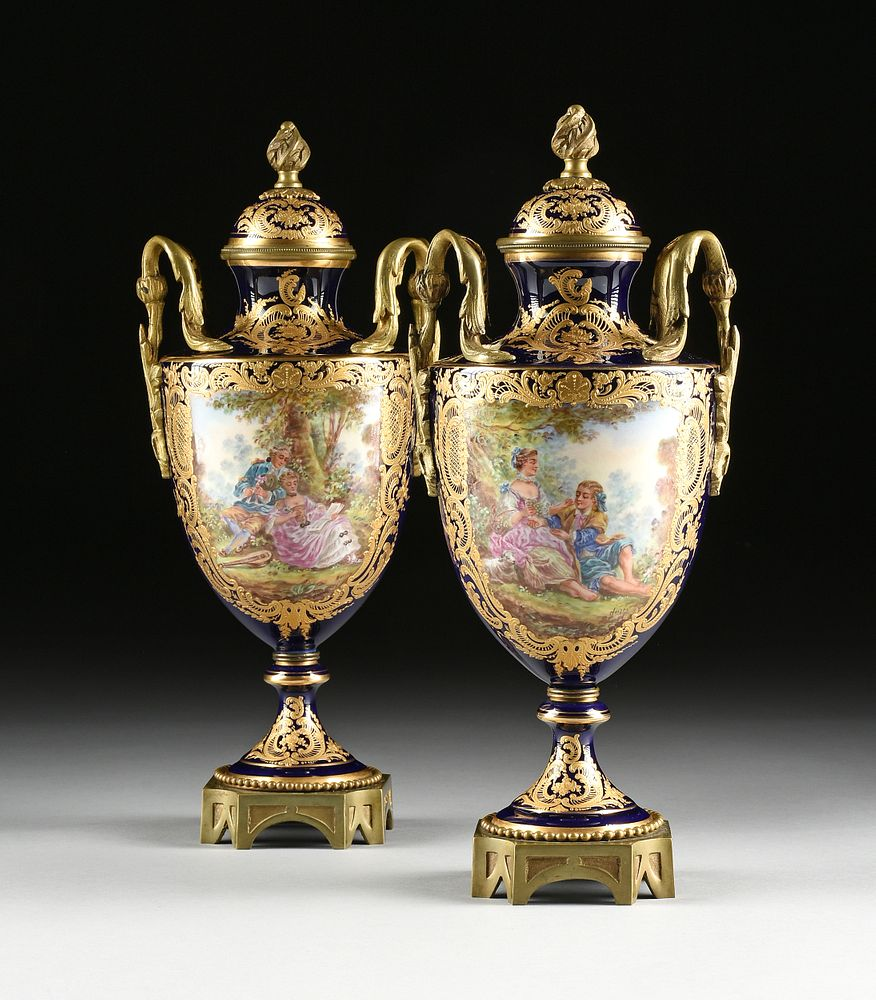 A PAIR OF S VRES STYLE ORMOLU MOUNTED PARCEL GILT
