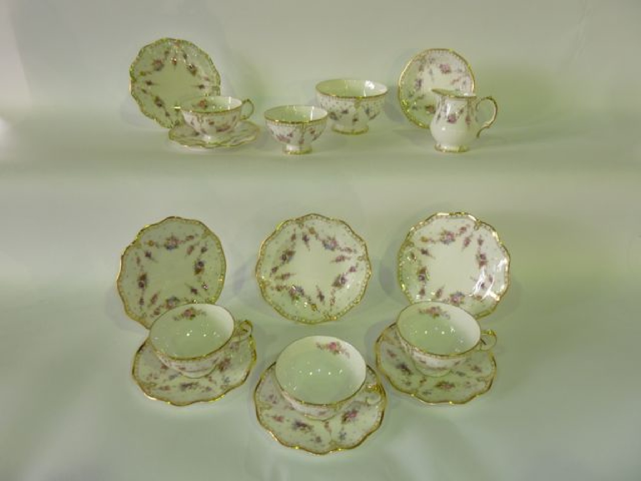 A quantity of Royal Crown Derby Royal Antoinette pattern tea