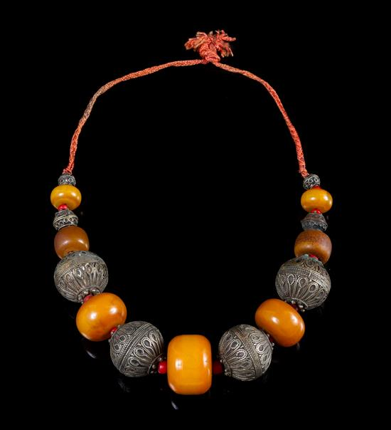 Sale 397 Lot 145 An Amber and Metal Beaded Necklace