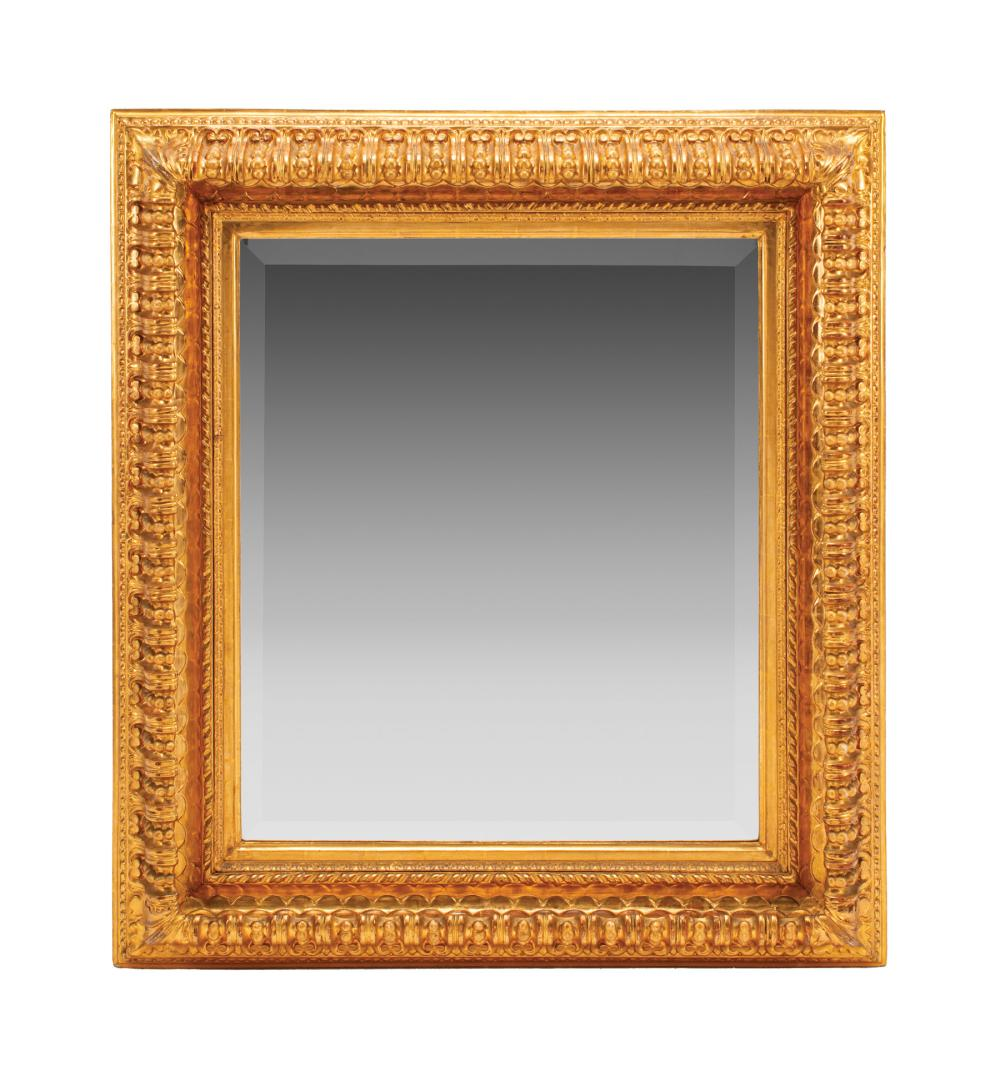 French Carved and Gilt Mirror 19th c heavy scrolled surround