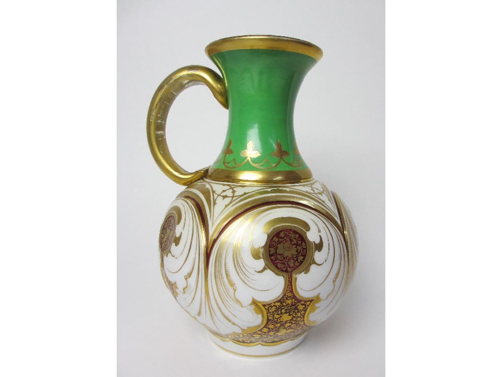 A Bohemian opaque overlaid glass ewer with green and gilt