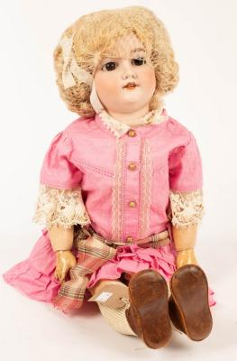 A large Armand Marseille bisque head doll with composition body