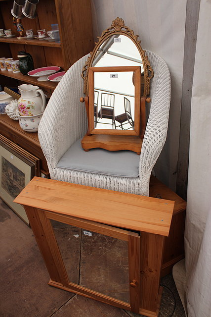 A WHITE PAINTED LLOYD LOOM TUB CHAIR a pair of