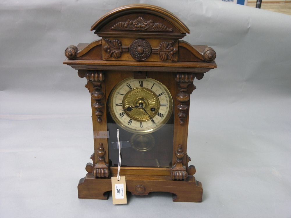 A late 19th century German mantel clock in architectural stained