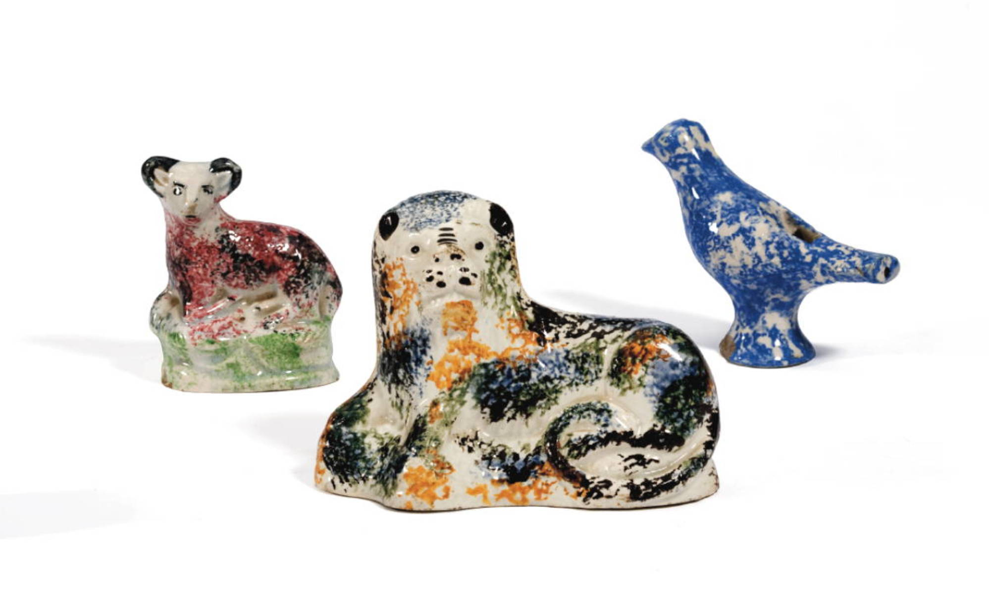 ENGLISH PEARLWARE FIGURE OF A RECUMBENT LION CIRCA 1790 1810
