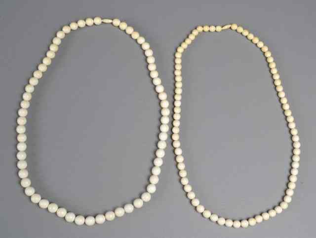 2 Large Chinese Ivory NecklacesBoth strung with circular beads each