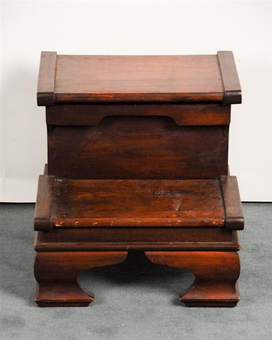 A Pine Bed Step stained mahogany the top step with