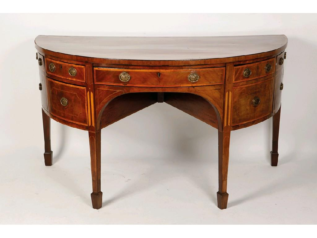 A LATE GEORGE III MAHOGANY SHERATON STYLE BOW FRONTED SIDEBOARD