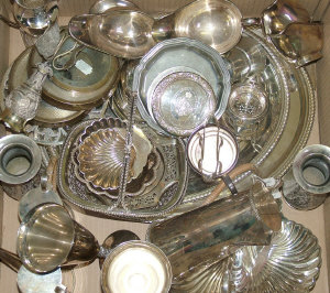 A pair of silver mounted bakelite coasters two pairs of