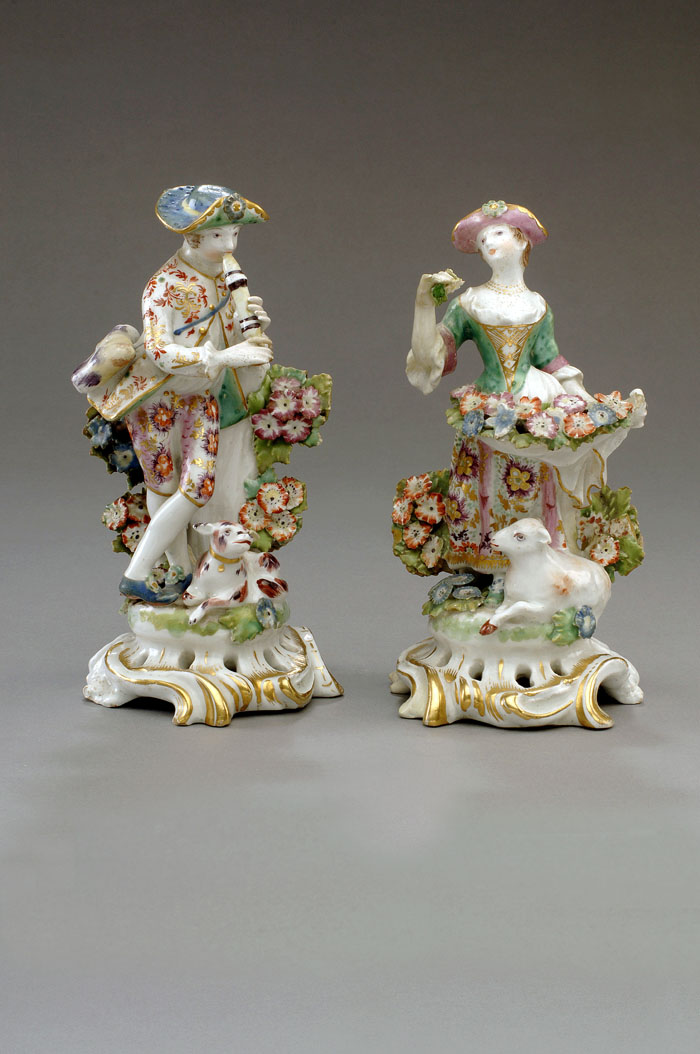 PAIR OF BOW PORCELAIN FIGURES OF A SHEPHERD AND SHEPHERDESS
