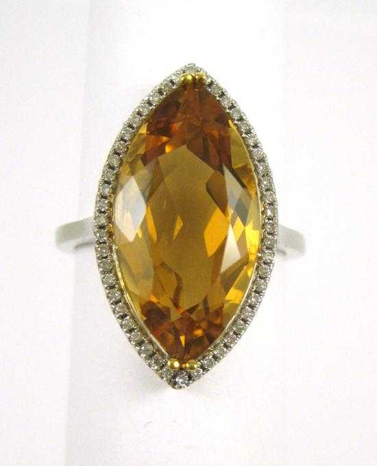 CITRINE DIAMOND AND FOURTEEN KARAT WHITE GOLD RING with round