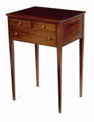 A mahogany side table inlaid brass stringing with two short