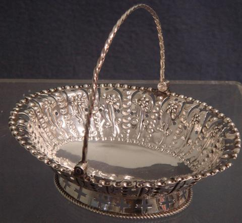 George III sterling silver basket with swing handles London 1774