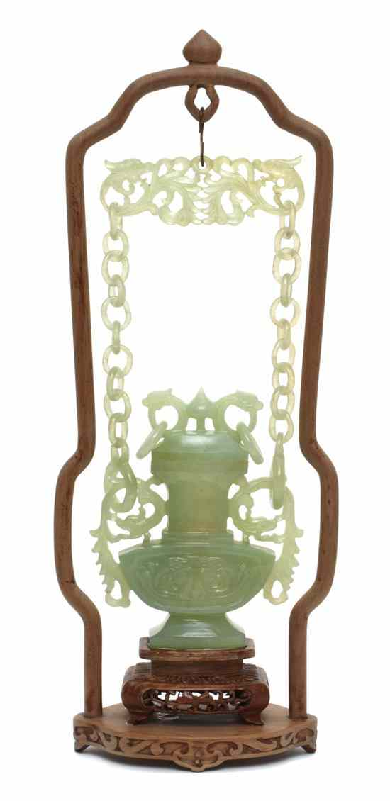 A Chinese Carved Hardstone Hanging Vessel the lid having a