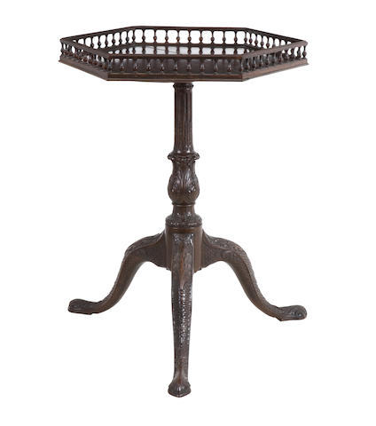 A mahogany snap top occassional table of George III design