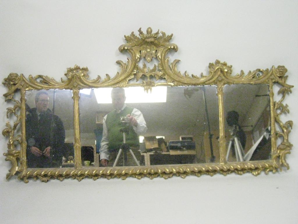 An antique giltwood Overmantel Mirror in the Chippendale manner with