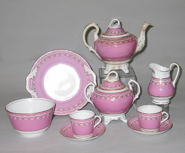 An English porcelain tea service mid 19th century Each decorated