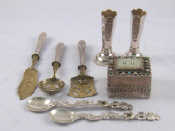 A pair of Continental spoons probably Dutch with putti holding