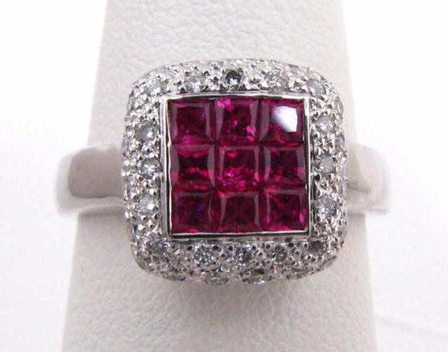 Lady s 18K white gold invisible set ruby and diamond
