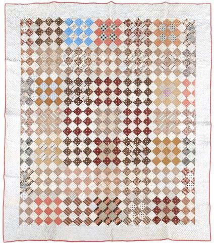 Hand stitched pieced quilt diagonal rows of squares of printed