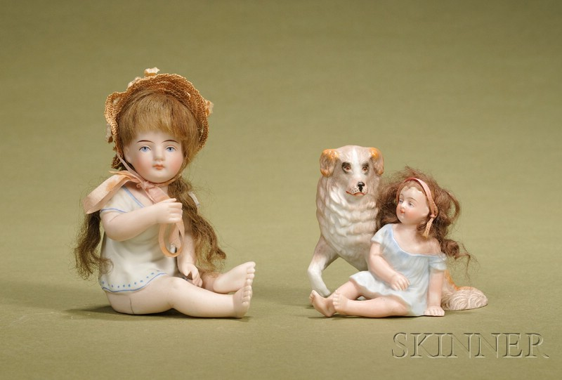 Two Bisque Children Figurines Germany c 1910 a seated child
