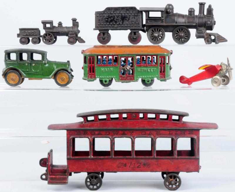 Lot of 7 Cast Iron Vehicle Toys Includes one engine