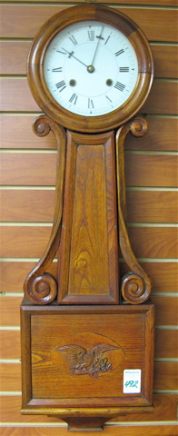 OAK BANJO WALL CLOCK American 20th century with spring wound