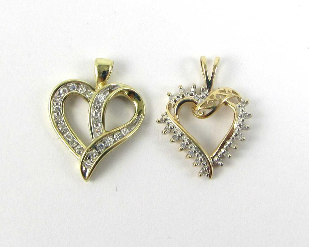 TWO DIAMOND AND YELLOW GOLD HEART PENDANTS 1 10k yellow