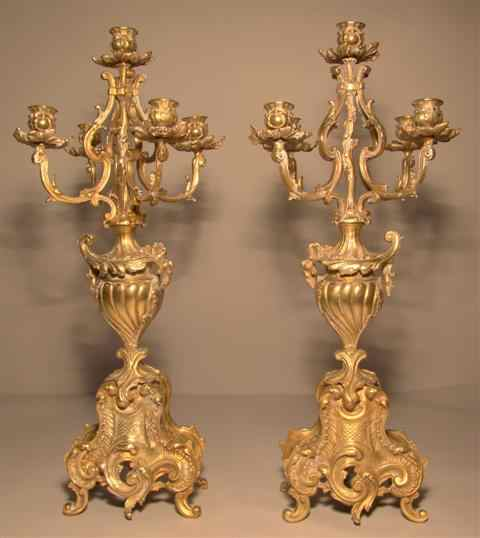 PAIR OF CONTINENTAL GILT METAL CANDELABRA cast with four scrolling