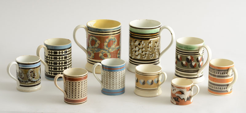 GROUP OF TEN BRITISH PEARLWARE MOCHA MUGS WITH LEAF CAPPED