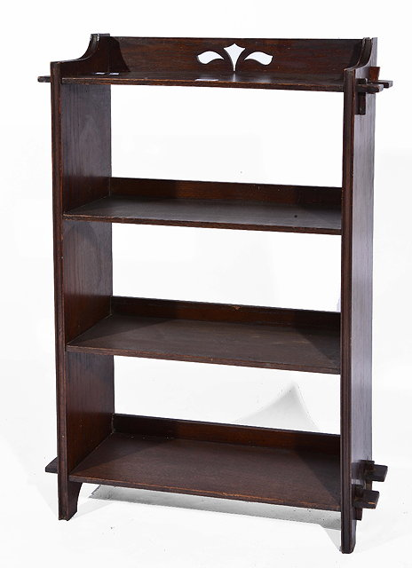 Early 20th Century oak open bookcaseof peg design with simple