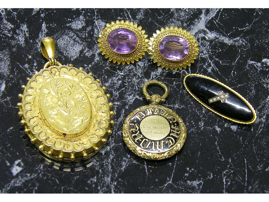 Oval silver gilt fancy locket engraved with flowers 50mm x