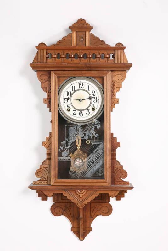 WATERBURY HANGING WALL CLOCK Eight day time and strike clock