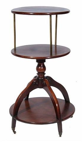 A MAHOGANY THREE TIER DUMB WAITER circular graduated form with