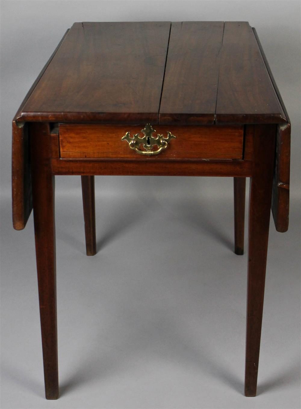 GEORGIAN MAHOGANY PEMBROKE TABLE having a rectangular top with molded