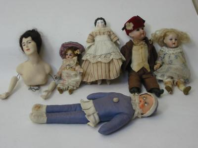 A Kammer Reinhardt bisque head girl doll with fixed blue