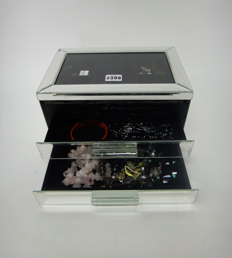 A collection of mostly costume jewellery including a faceted garnet