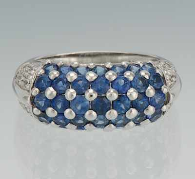 A Ladies Sapphire and Diamond Ring 14k white gold ring