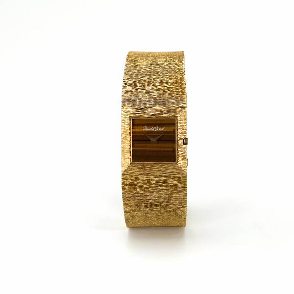Beuche Girod An 18k gold bracelet watch with tigers eye