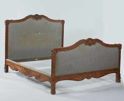 A French Carved and Upholstered Headboard Footboard and Side Rails