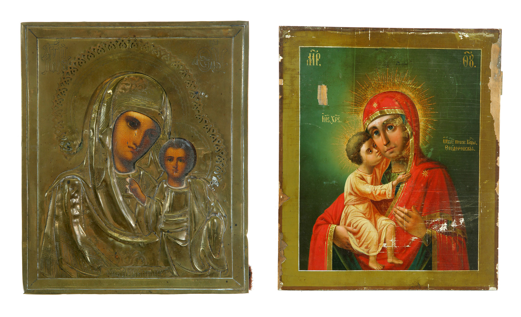 TWO RUSSIAN ICONS Nineteenth century pine Single boards with original