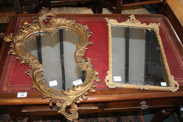 A CONTINENTAL CARVED GILTWOOD ASYMMETRIC WALL MIRROR circa 1900 73cm