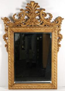 Large Carved Giltwood Mirror With ornate scrolling foliage anthemion and