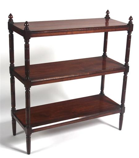 An Edwardian mahogany three tier tag re the chamfered rectangular