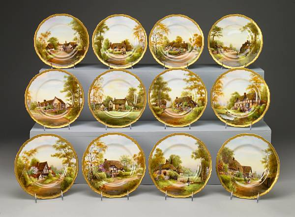 A set of twelve Royal Worcester porcelain cabinet plates painted