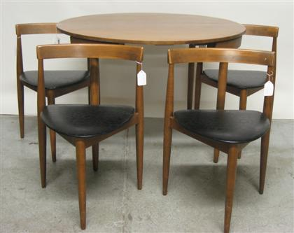 Extending dining table with four chairs after hans olsen danish