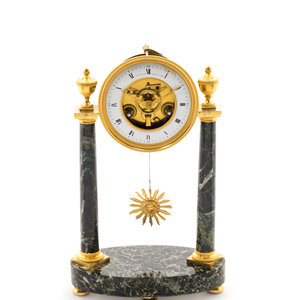 A Directoire Gilt Bronze and Marble Mantel Clock 19th Century