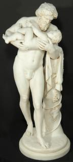A RARE 19TH C MARBLE GROUP OF SILENUS AND DIONYSUS