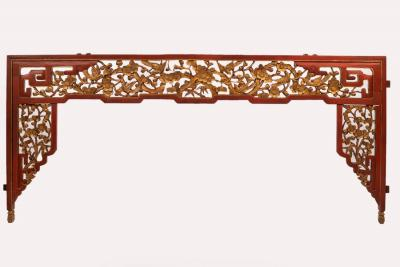 A Chinese painted bed head with pierced and carved decoration