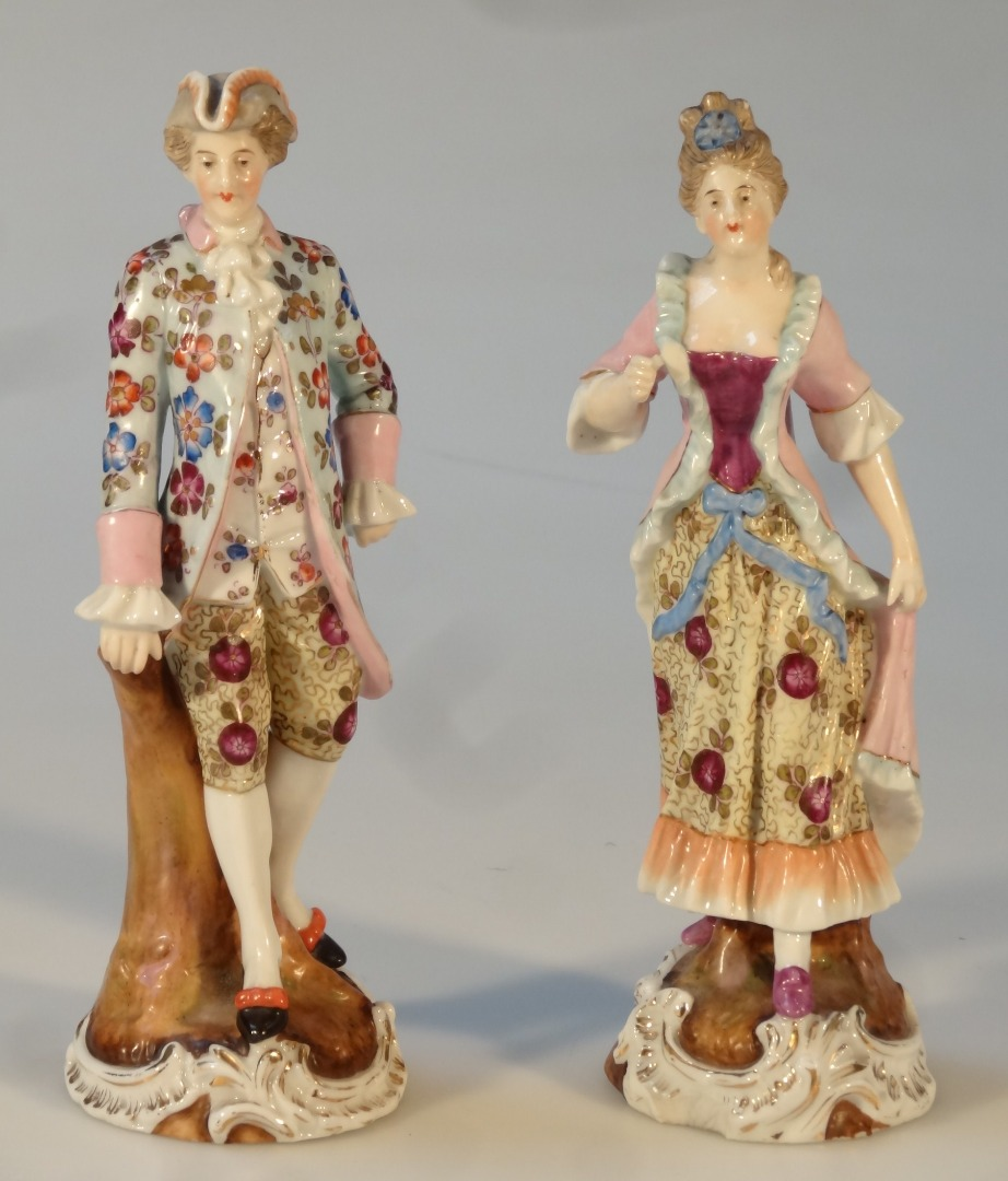 A pair of 20thC Sitzendorf porcelain figures of a lady